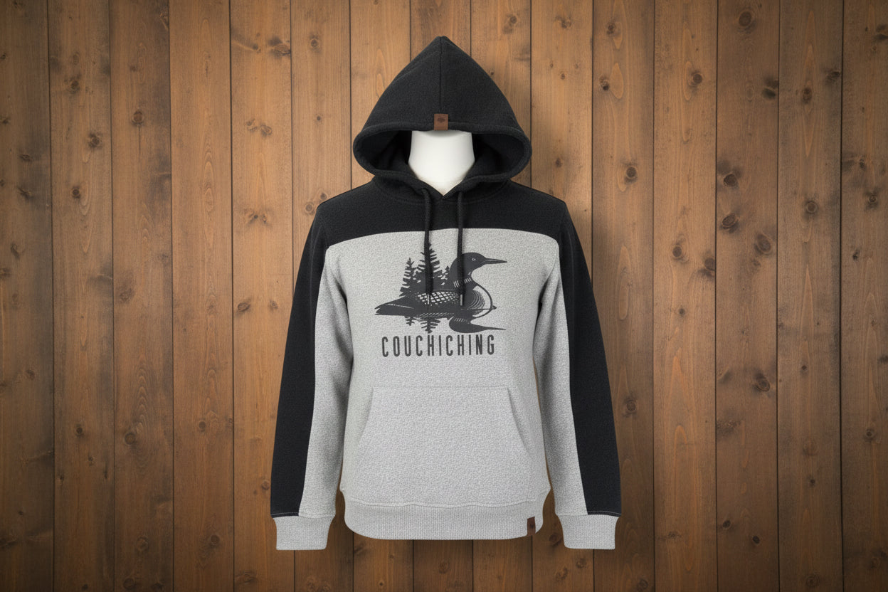 A hooded sweatshirt with a loon bird design and the text 'COUCHICHING' on the front.