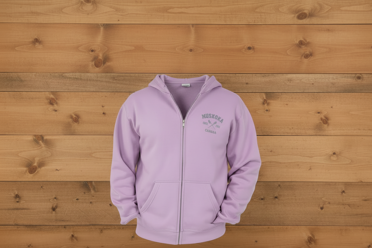 Man wearing a purple hoodie with a brand logo on a white background