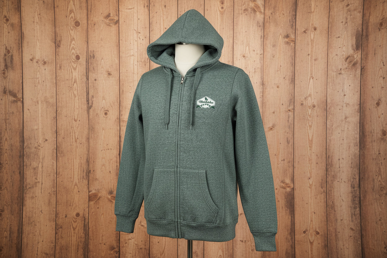 Green full-zip hoodie with a hood, featuring a white embroidered crest on the chest, long sleeves, and banded cuffs.