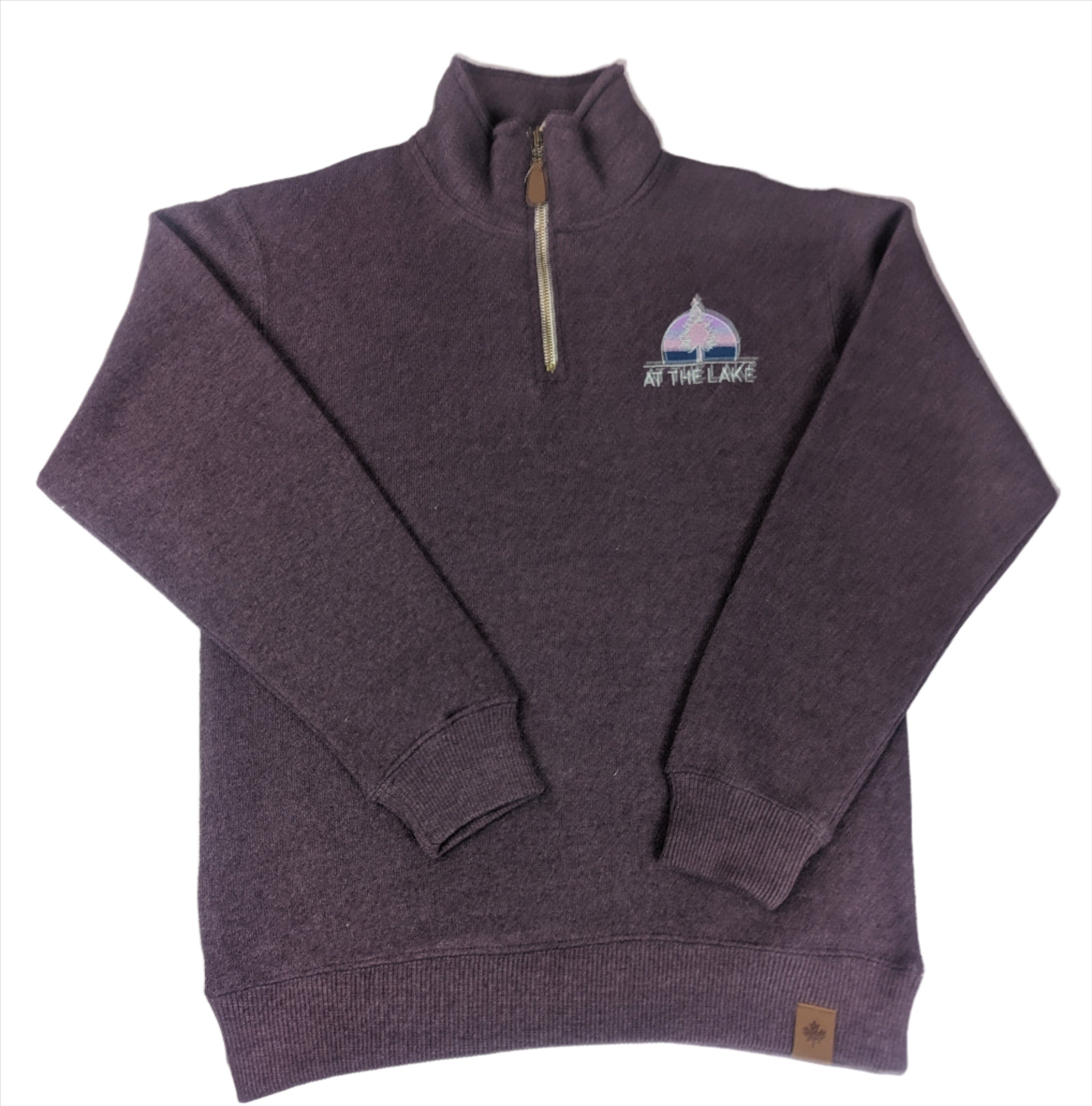 A purple Nantucket quarter zip sweater with a small logo on the chest.