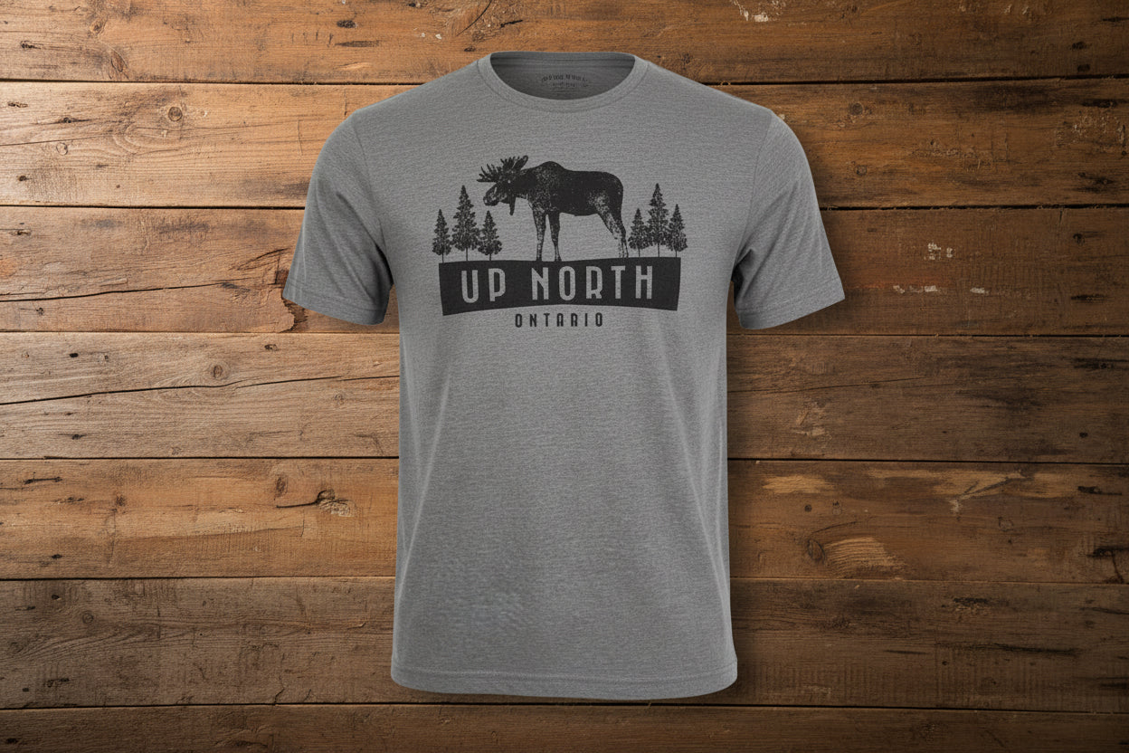 A gray t-shirt with a graphic print of a moose and trees, and the text 'UP NORTH ONTARIO'.