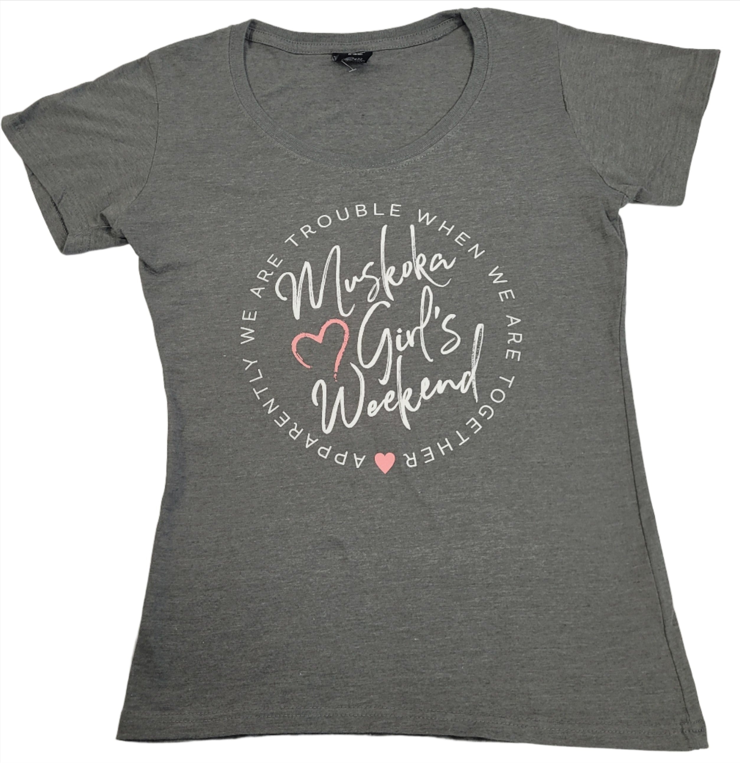 A light grey t-shirt with the text 'Muskoka Girls Weekend' and heart graphics printed on the front.
