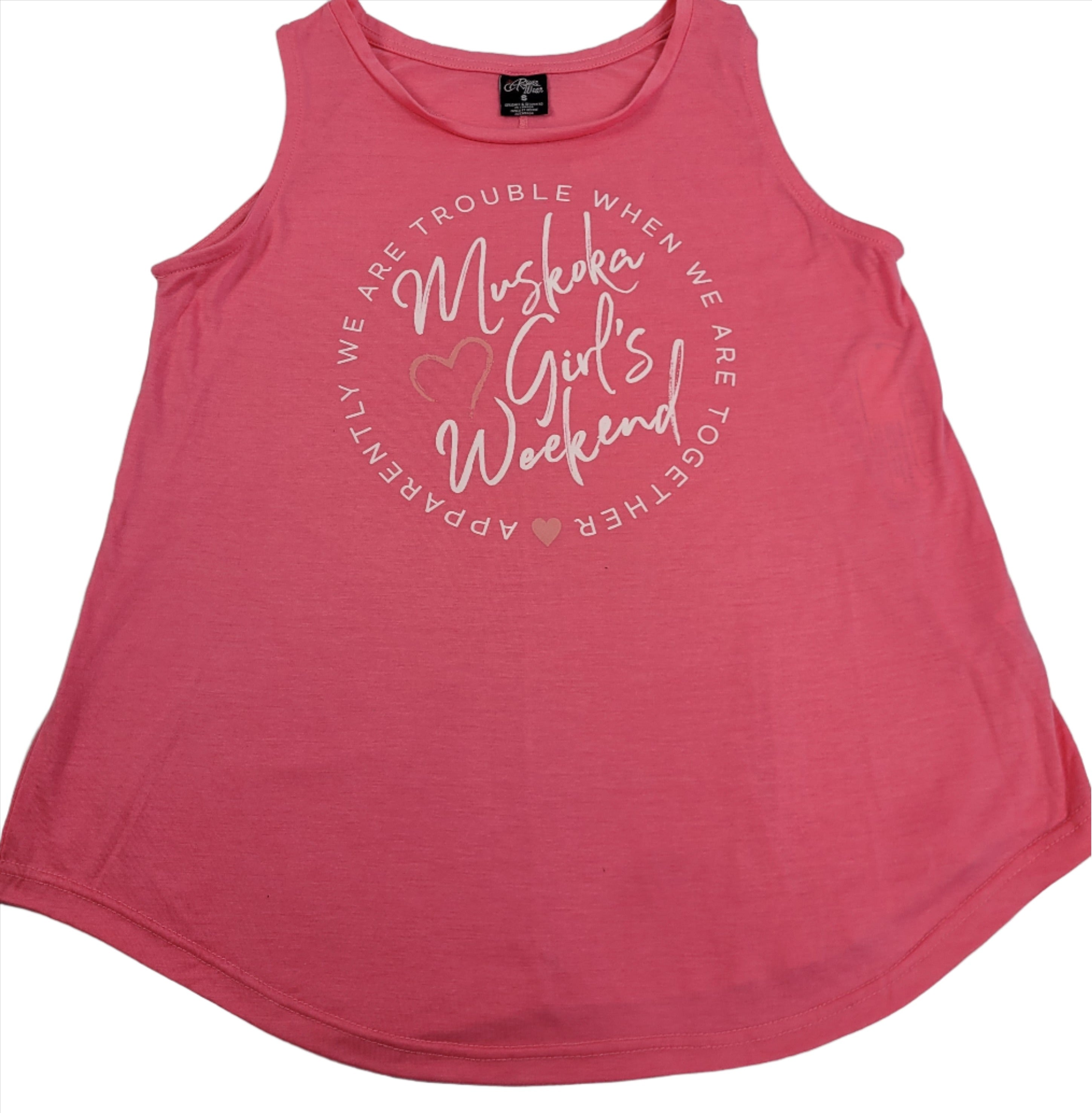 A pink flowy tank top with the text 'Muskoka Girls Weekend' printed on the front.